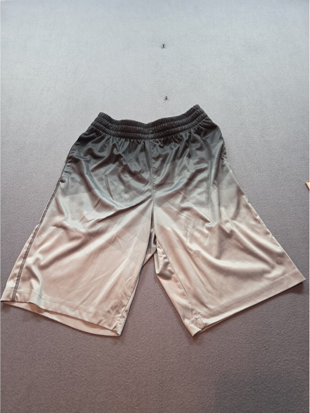 men's gray athletic shorts W/ an elastic waistband and drawstring by Xersion